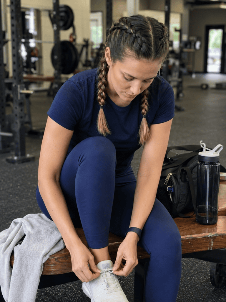Dutch braid pigtails keeping hair secure during an early morning gym session