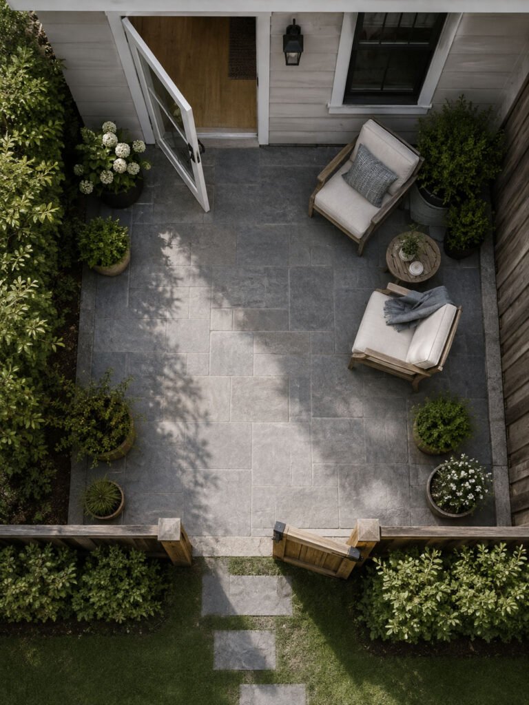 Top-down patio arrangement with an open back door and an unobstructed route between seating and the yard