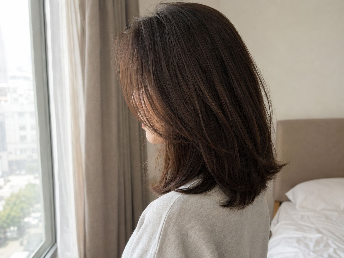 Layered hair with ends curving under